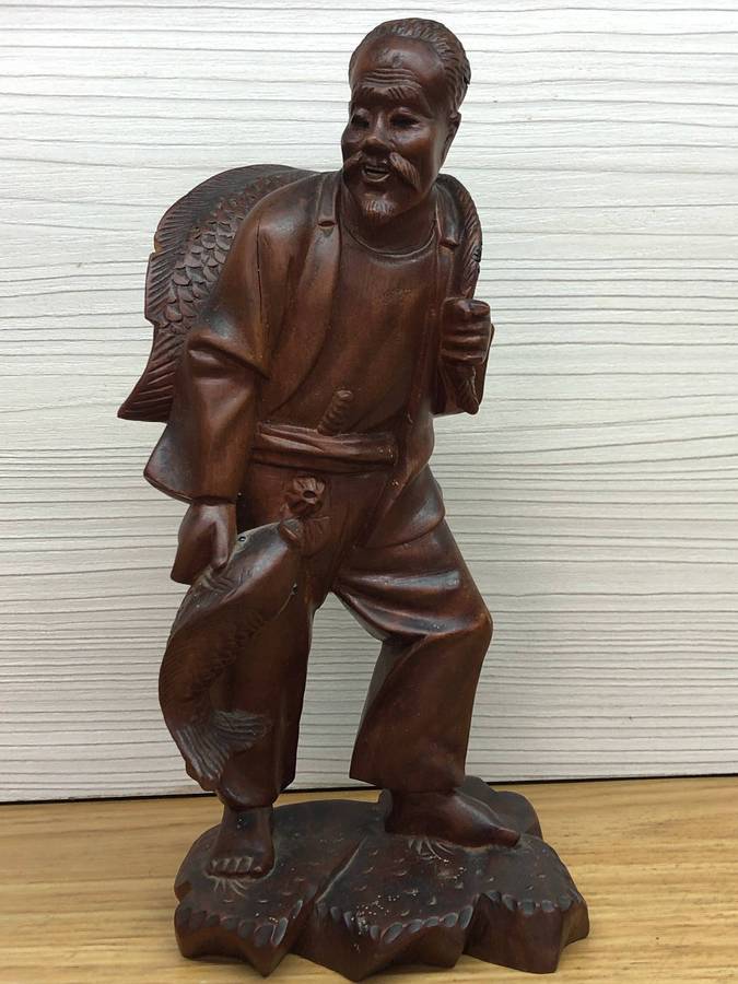Antique carved Chinese rosewood figure of a fisherman - c19th C
