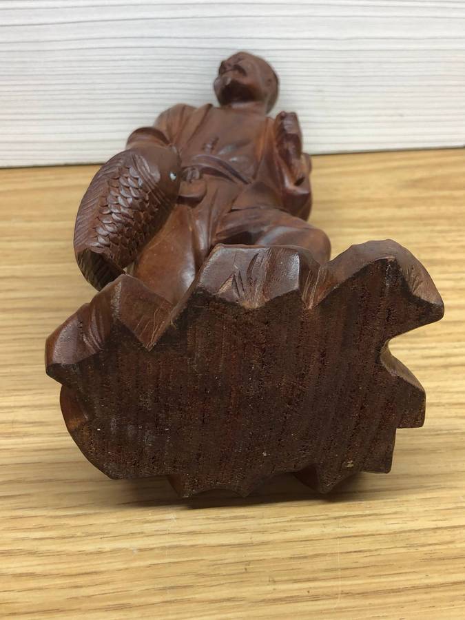 Antique carved Chinese rosewood figure of a fisherman - c19th C