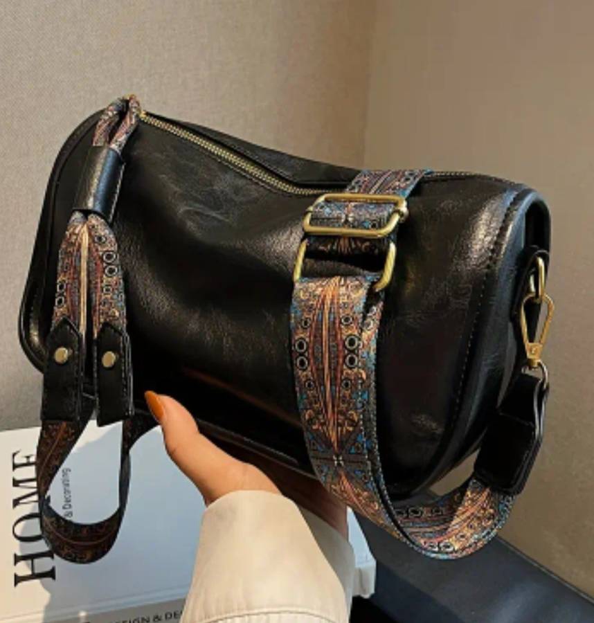 Black woman's shoulder sling handbag