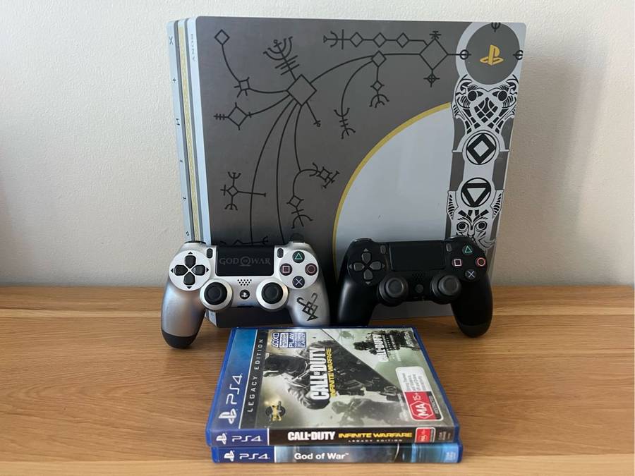 PS4 Pro 1TB  God of War Limited Edition Bundle 2 Games + 2 Controllers