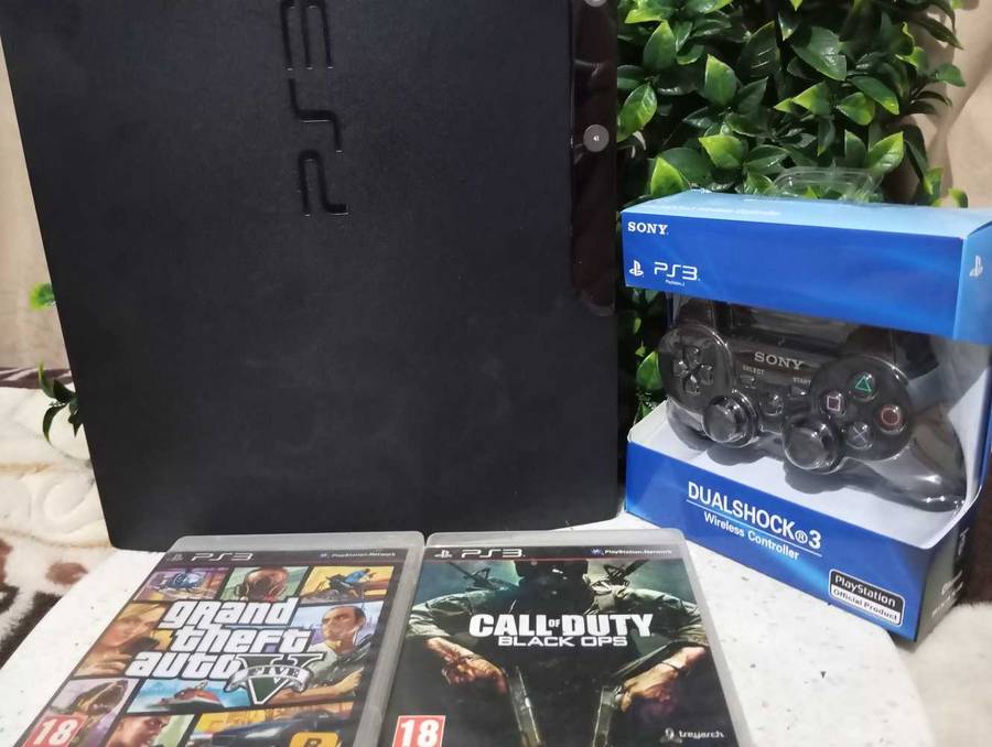 PS3 slim 1tb + 2 games