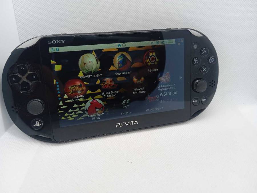 Ps Vita slim  loaded with 50+ Games (128GB Memory Card)
