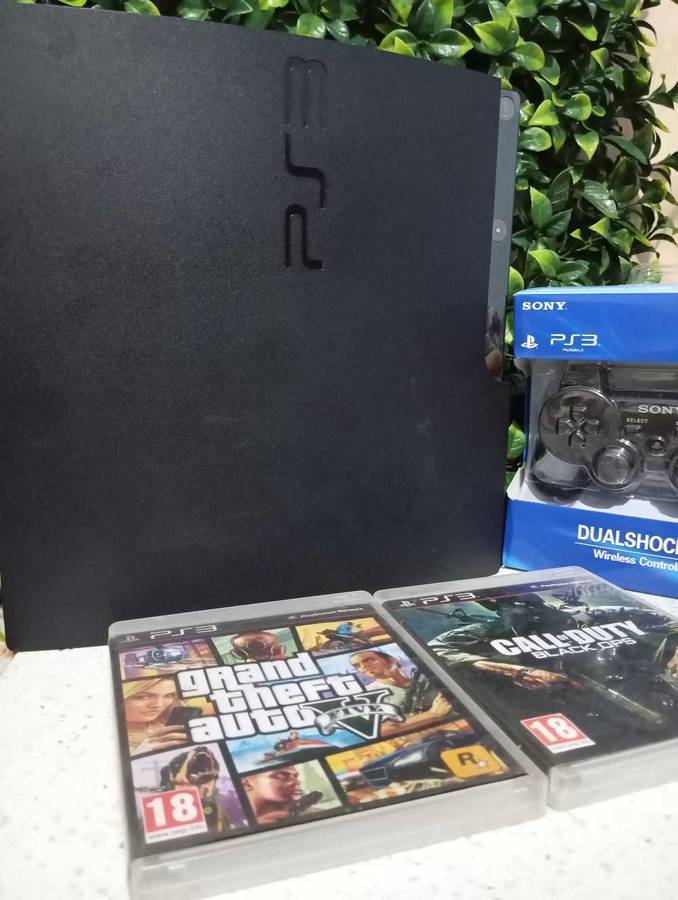 PS3 slim 1tb + 2 games