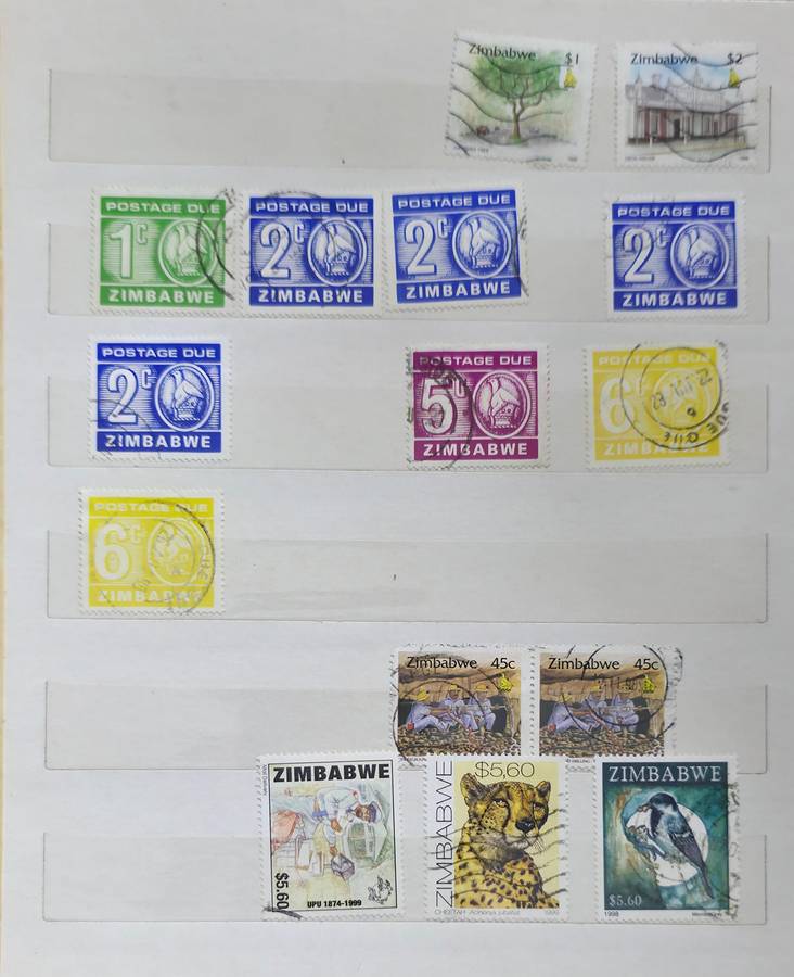 Stock Book: 10 White Pages/ 20 Sides with Used World Mix - Nice Starter