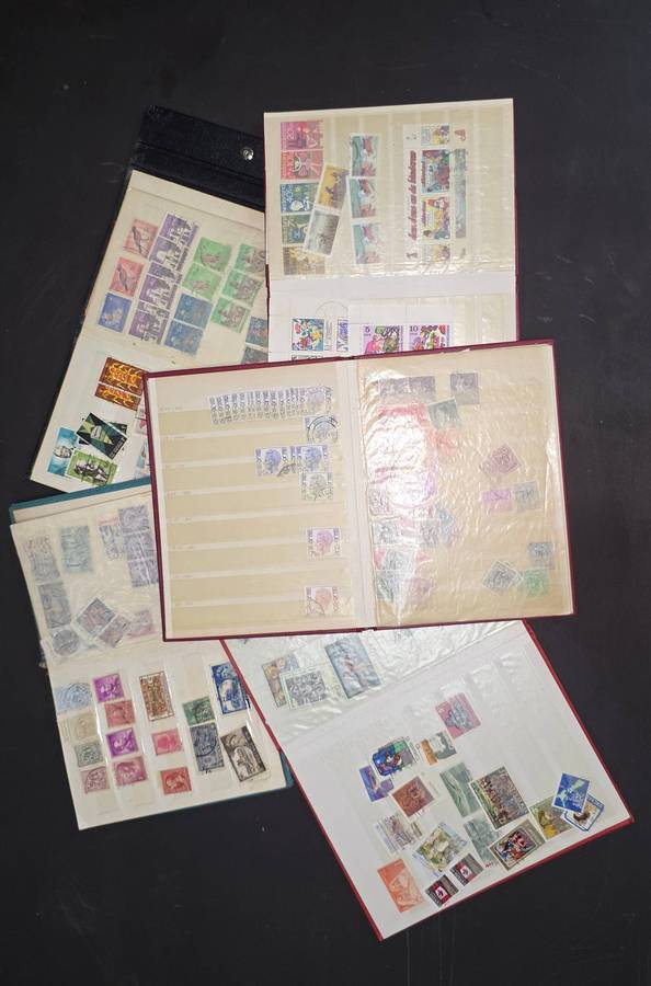 Stock Books: 5 Small Stock Books (Well Used) with Assorted World: Nice Starter!