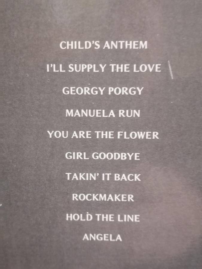 Toto, vinyl very good.