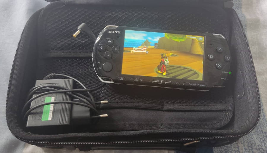PSP Collection (PSP Console + 14 Games + Carry Case + Charger)
