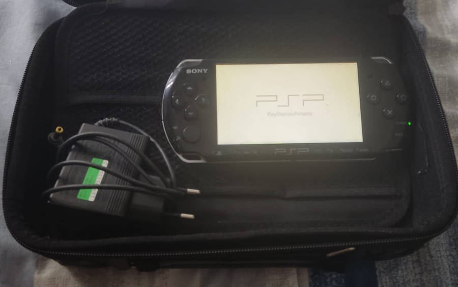 PSP Collection (PSP Console + 14 Games + Carry Case + Charger)