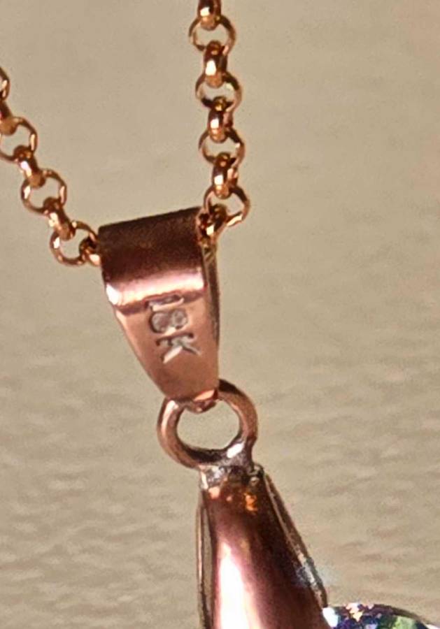 18 K gold bale including FREE CHAIN & FREE SWAROVSKI CRYSTAL HEART