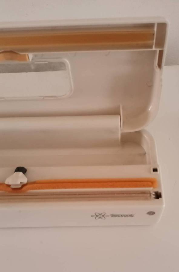 MERCURY VACUUM SEALER.