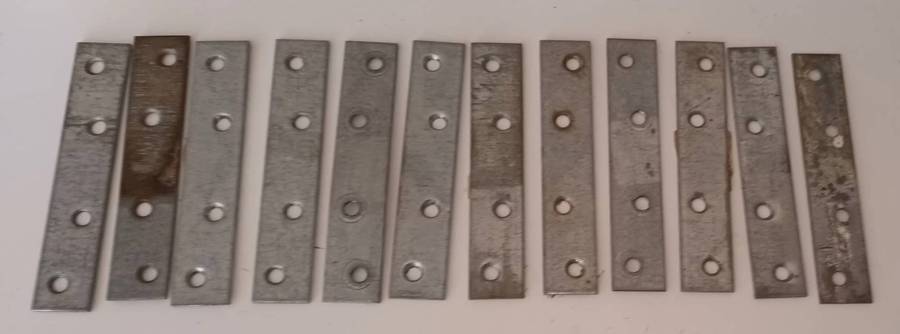 12x Mending Plates. Length 10cm. Width 2cm.