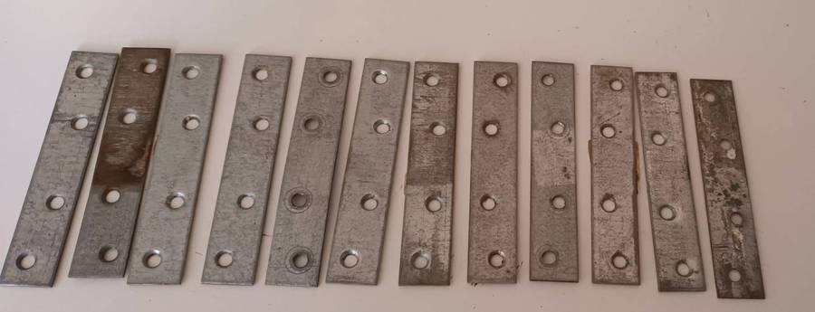 12x Mending Plates. Length 10cm. Width 2cm.