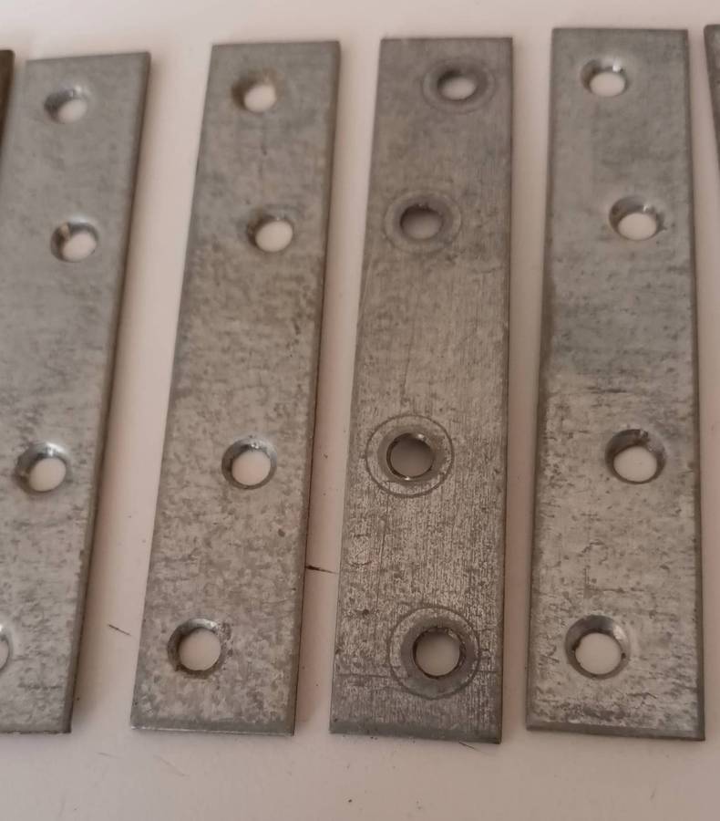 12x Mending Plates. Length 10cm. Width 2cm.