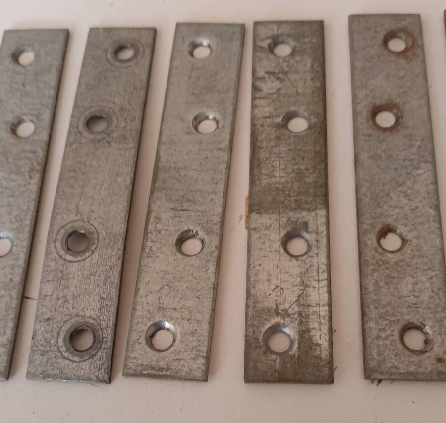 12x Mending Plates. Length 10cm. Width 2cm.