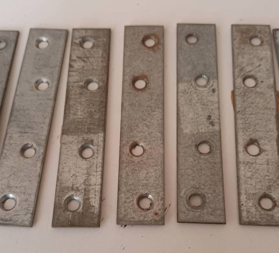 12x Mending Plates. Length 10cm. Width 2cm.