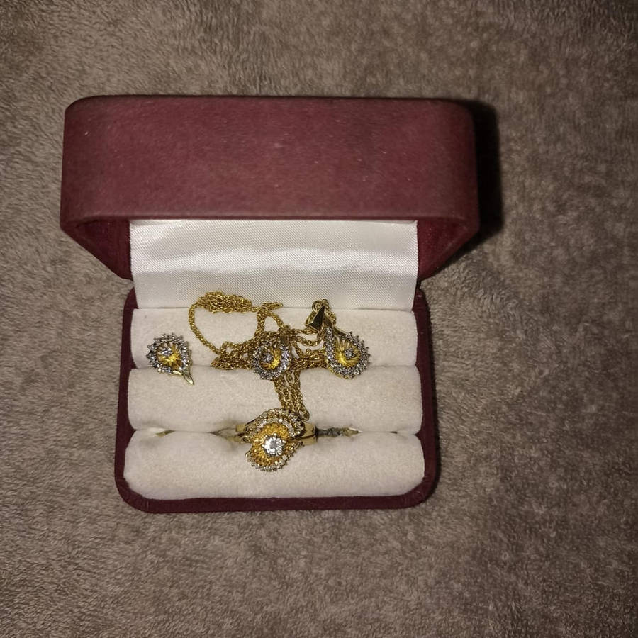 18 carat Angel diamond ring with 9 carat diamond earrings and pendant  rare to find as a set.