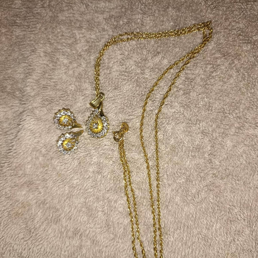 18 carat Angel diamond ring with 9 carat diamond earrings and pendant  rare to find as a set.