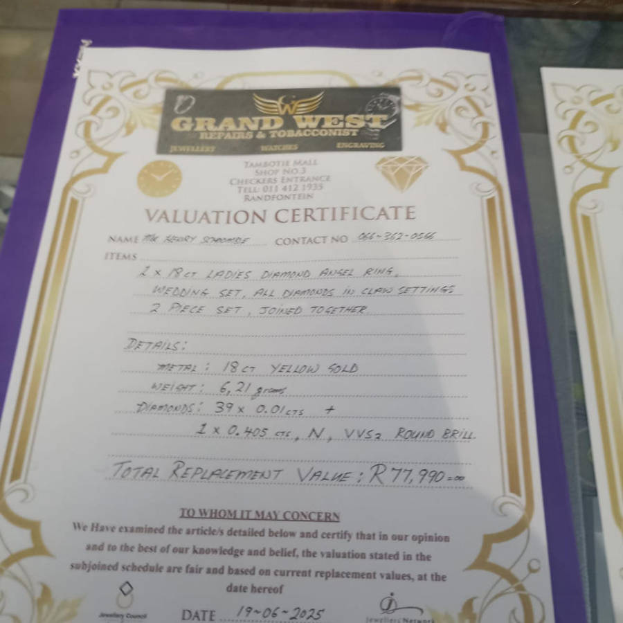 18 carat Angel diamond ring with 9 carat diamond earrings and pendant  rare to find as a set.