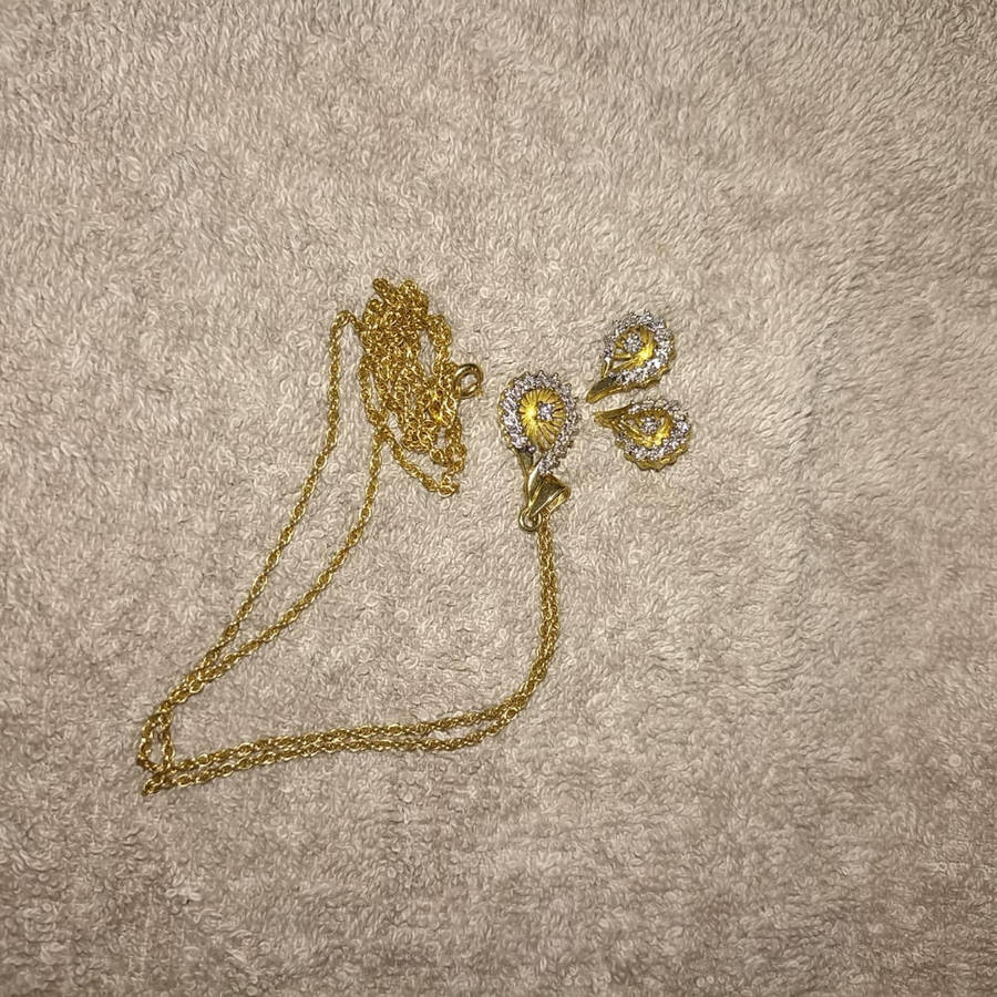 18 carat Angel diamond ring with 9 carat diamond earrings and pendant  rare to find as a set.