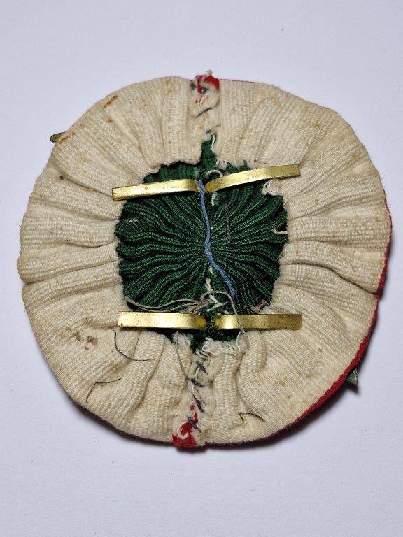WW2 Italian Alpine troop Helmet Badge. Fastening plates intact.