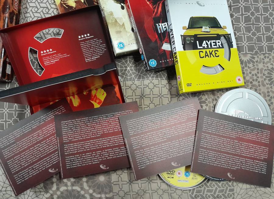 5 movie bundle (2 dvd sets, each with cards in movie reel tins)