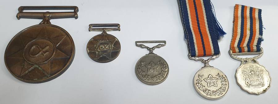 Collection of 4 SADF medals - 1 regular and 3 miniatures