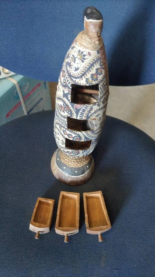 Vintage carved gourd with little trinket drawers on a Coconut shell stand. All natural