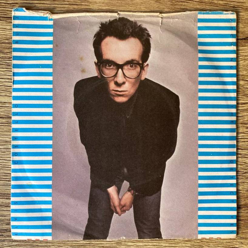 Elvis Costello - Watching the Detectives 7"/single (1977 UK import) VG+/VG-