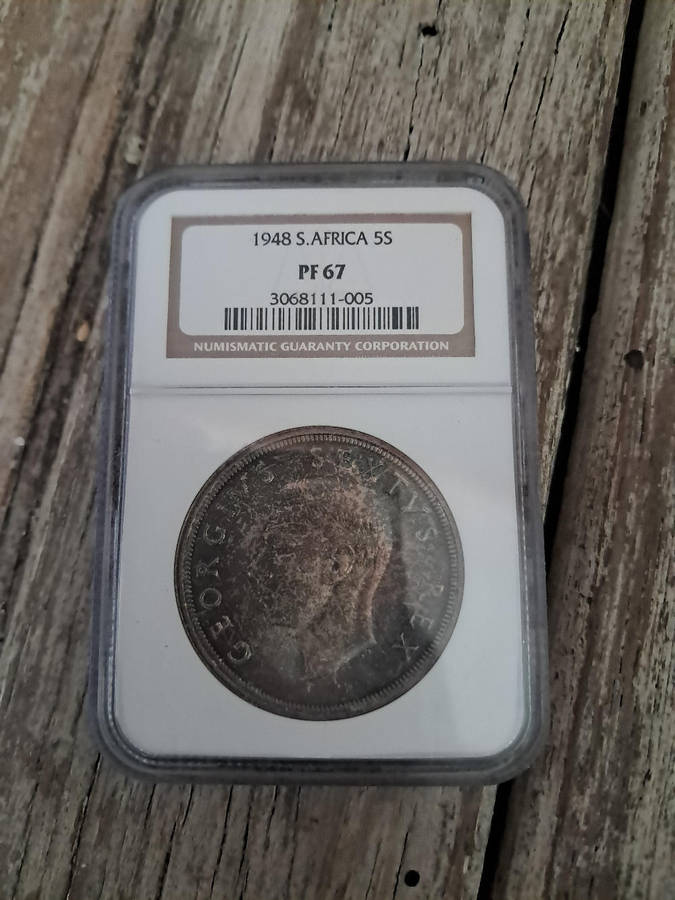 1948 5 Shillings. Very highly graded by the NGC. PF67!