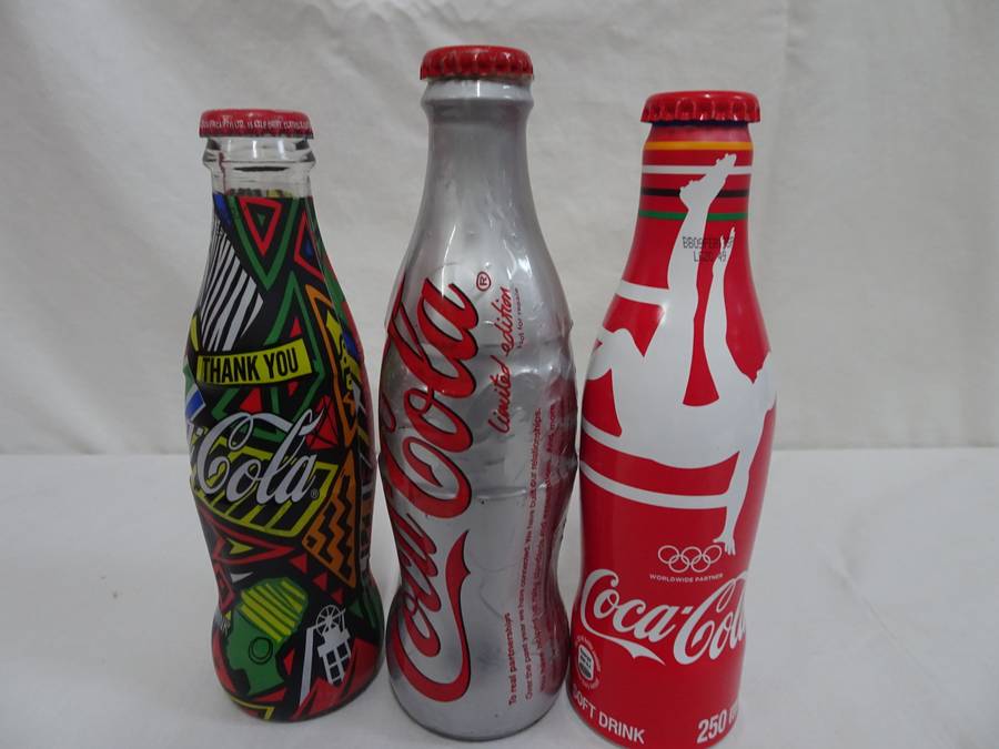 Collection Of 8x Coco Cola Glass Bottles +One Coca-Cola FIFA World Cup Russia 2018 Soccer Metal Ball