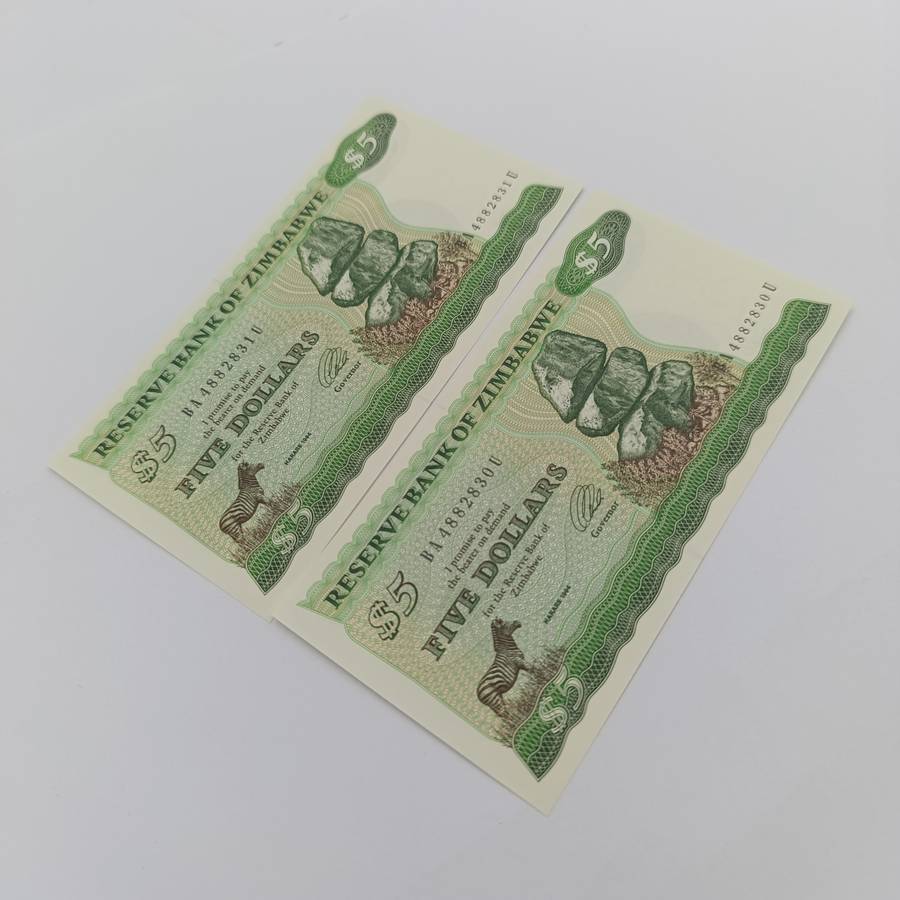 Zimbabwe 1994 pair of $5 banknotes uncirculated with consecutive numbers - short neck bird watermark