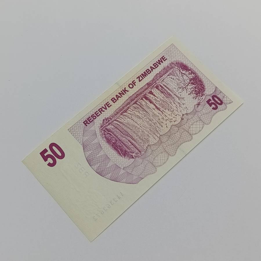 Zimbabwe $50 Bearer cheques issued 1 Aug 2006 Pair of AA numbered uncirculated notes