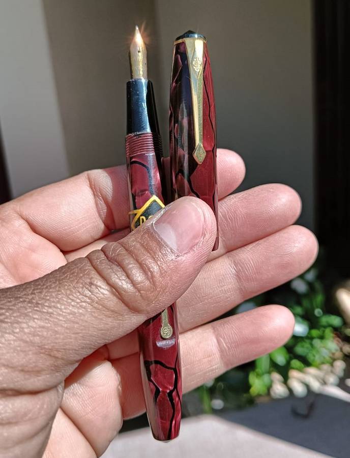 A 14ct Gold Nib on a Superb 1955 Conway Stewart No 15 Burgundy Marble Fountain Pen
