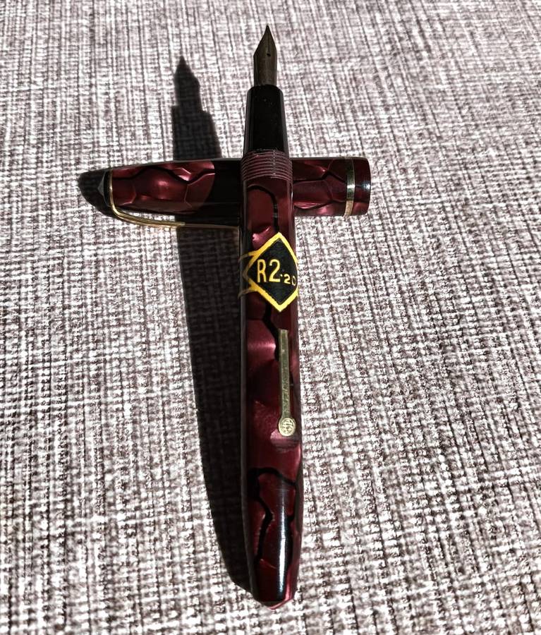 A 14ct Gold Nib on a Superb 1955 Conway Stewart No 15 Burgundy Marble Fountain Pen