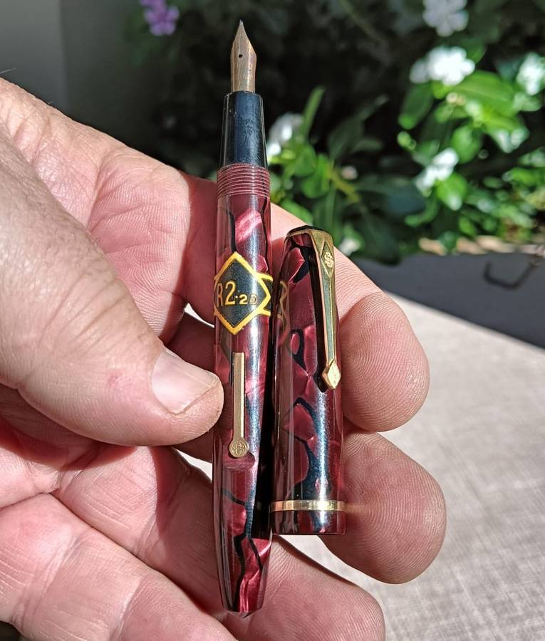 A 14ct Gold Nib on a Superb 1955 Conway Stewart No 15 Burgundy Marble Fountain Pen