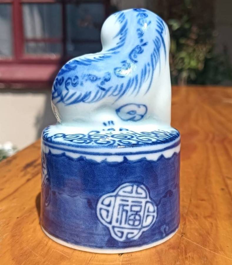 Asian Porcelain Candle Snuffer Fu Dog with Human or Lion Face  Bats and Chinese Longevity Symbols