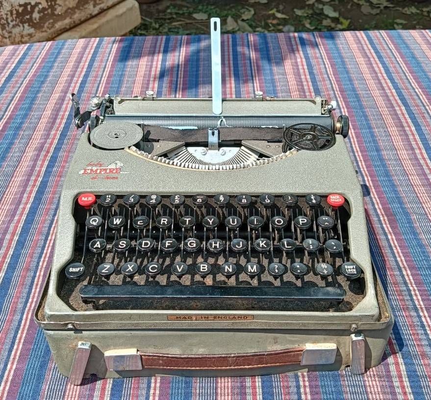A Pre WW2 1939 Serial Baby Empire De-Luxe Typewriter a Swiss Hermes Baby clone with original Case