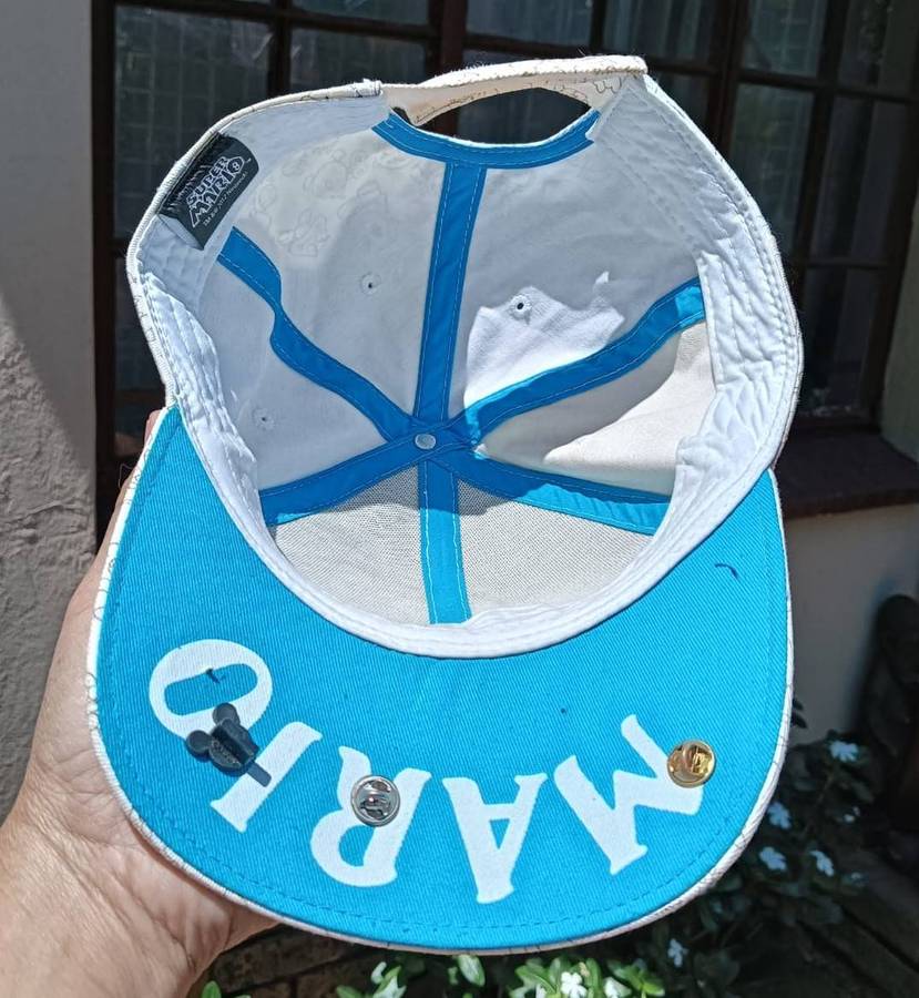 Super Mario Brothers Nintendo 2012 Snapback Cap with 2 pinned Pokemon League Gym Badges