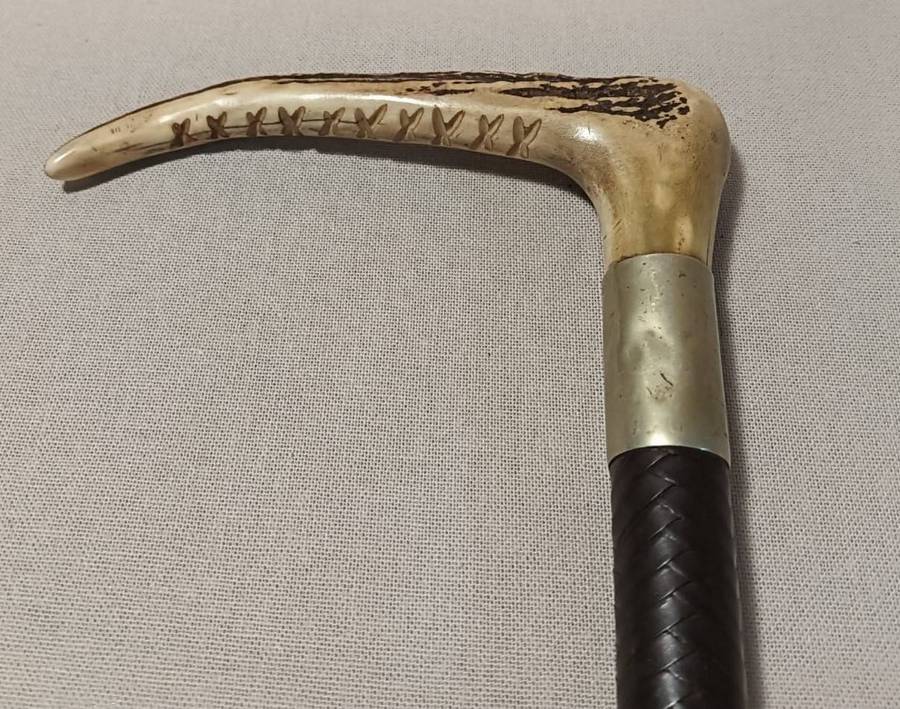 Two Antique Leather and Bone Handle Hunting Crops one with a Gloria Kerschot Silver Metal Collar