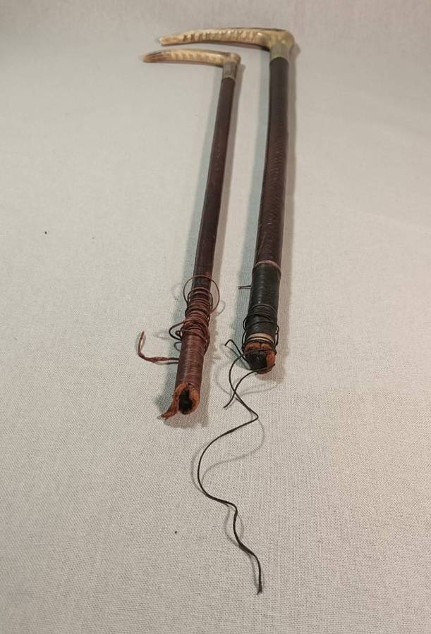 Two Antique Leather and Bone Handle Hunting Crops one with a Gloria Kerschot Silver Metal Collar