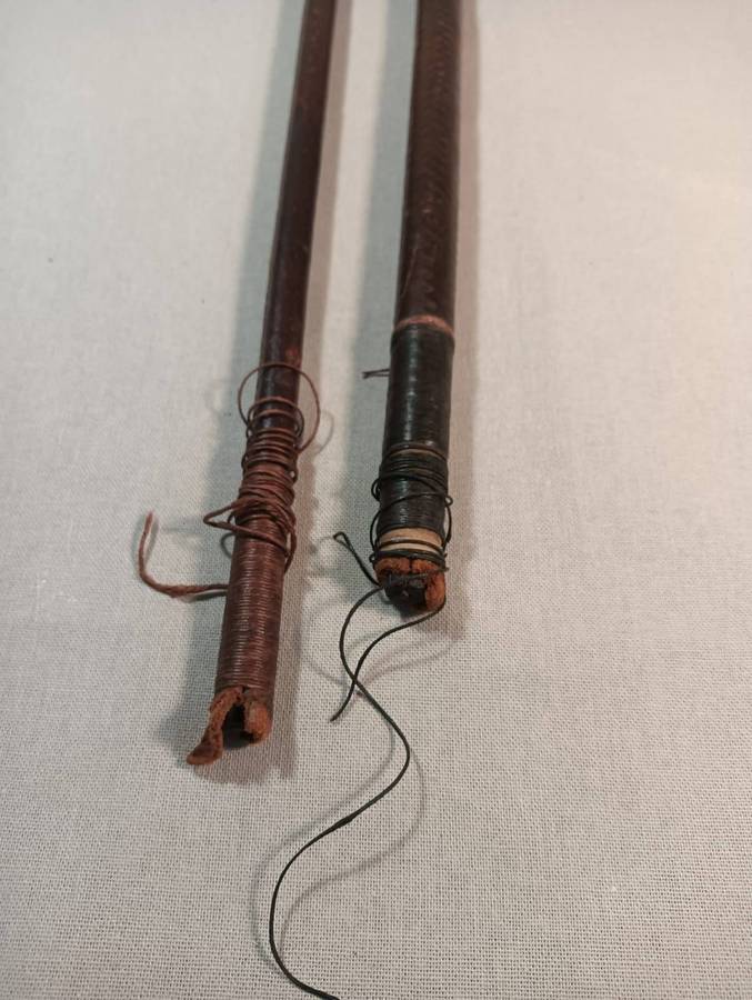 Two Antique Leather and Bone Handle Hunting Crops one with a Gloria Kerschot Silver Metal Collar