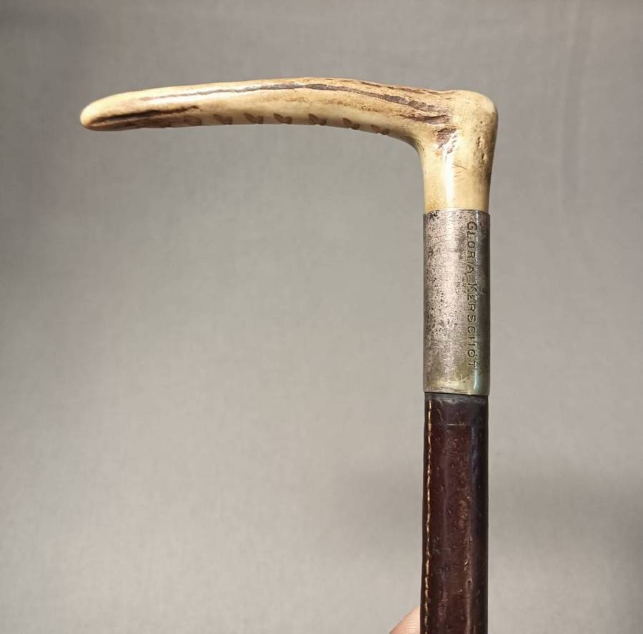 Two Antique Leather and Bone Handle Hunting Crops one with a Gloria Kerschot Silver Metal Collar