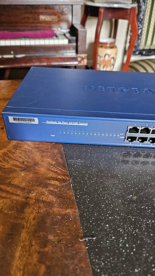 2 X NETGEAR Prosafe 16 Port 10/100 Switch. "Unused"