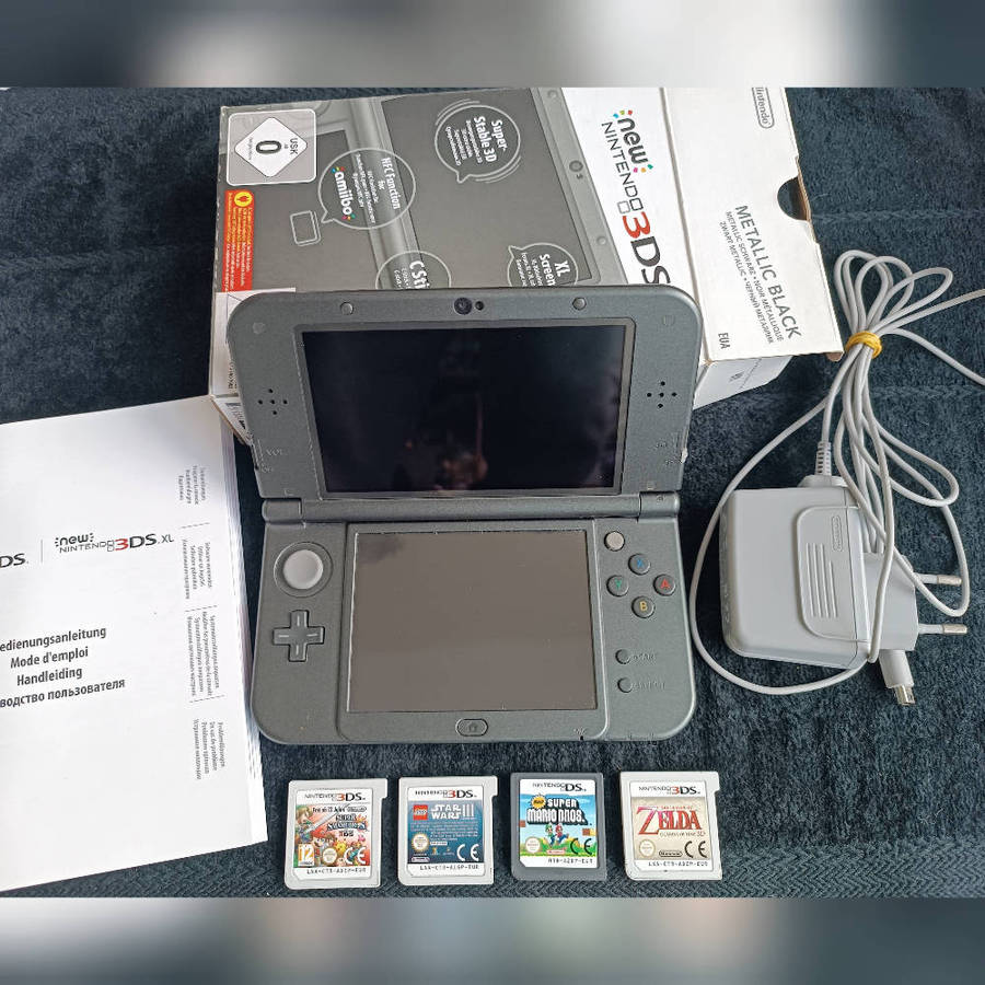 Nintendo 'new' 3DS xl + 4 top games excellent condition
