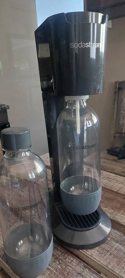 like new sodastream genesis machine included gas and bottle x 2 (still has gas in tank)
