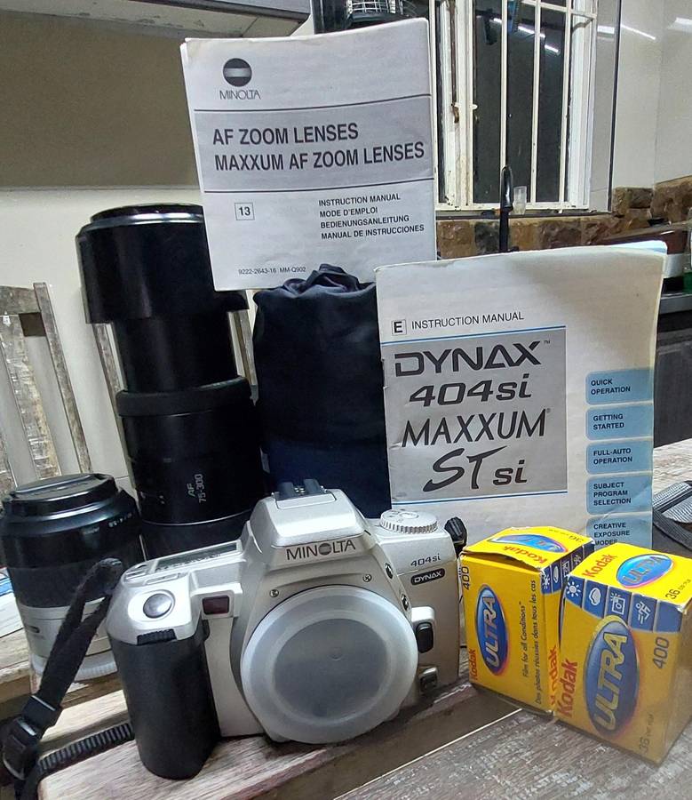 top condition made in Japan minolta camera with huge zoom lens incl jessop lens case and 2 box film