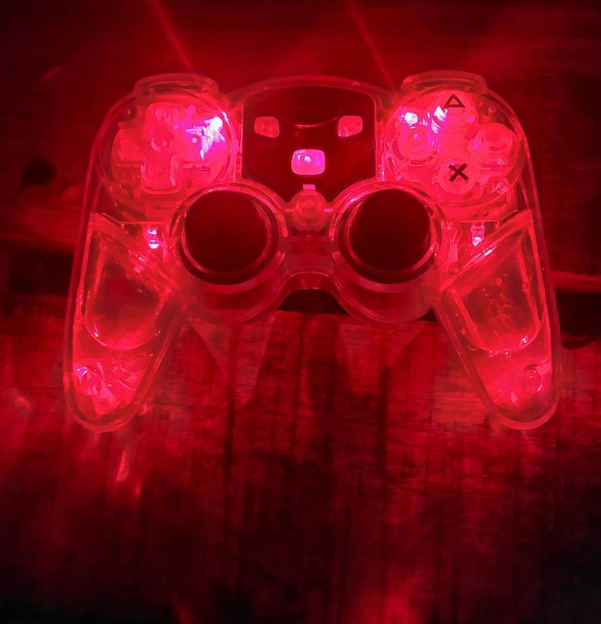 Dream gear lava glo wireless Playstation controller x2 bid for both