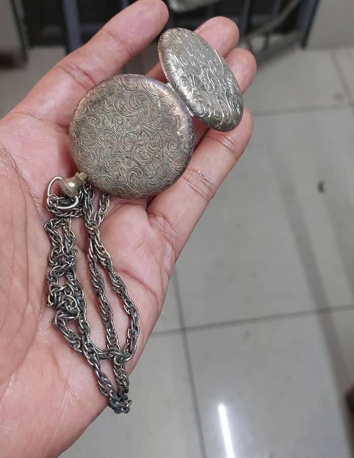 Vintage necklace and locket item very old and tarnished