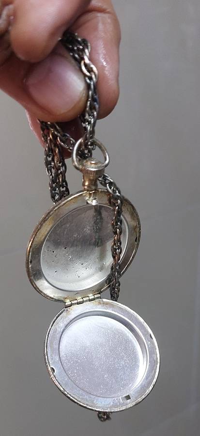 Vintage necklace and locket item very old and tarnished