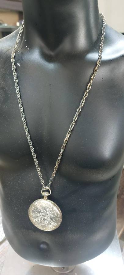 Vintage necklace and locket item very old and tarnished